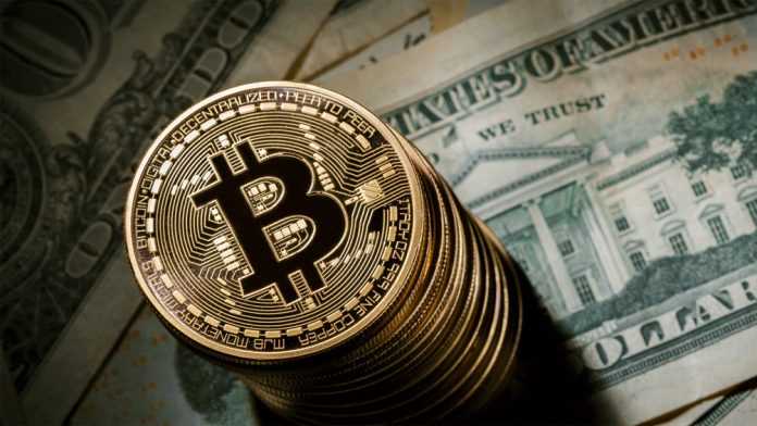 fila de Bitcoins encima de dolares